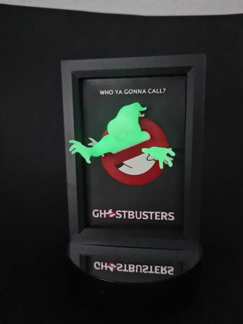 Who ya gonna call? Ghostbusters ... little ghost escaping the orginal movie poster