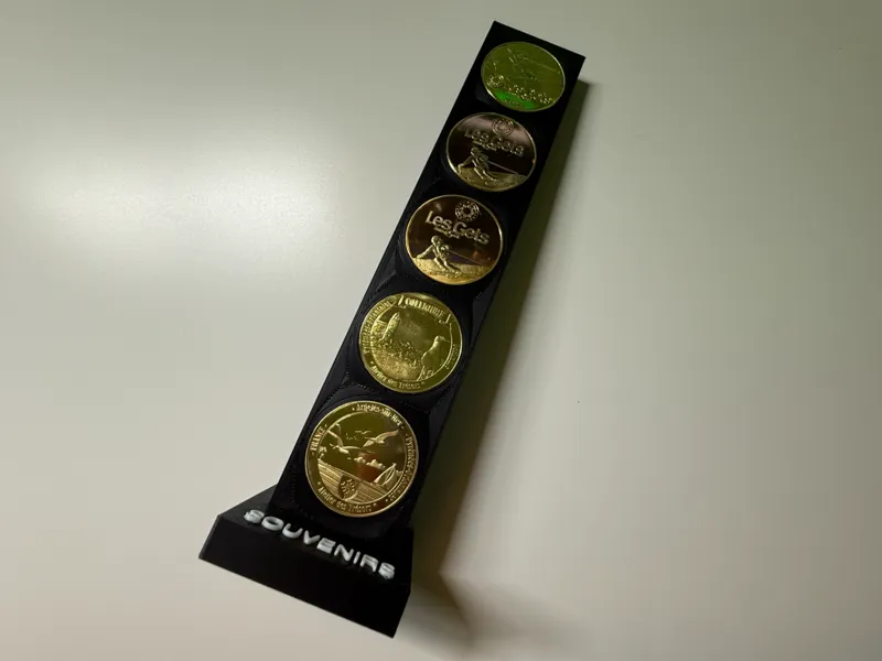 Présentoir à pièces souvenir