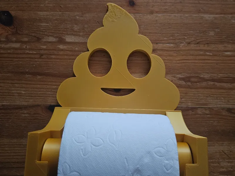 Devidoir papier toilette en forme de poop