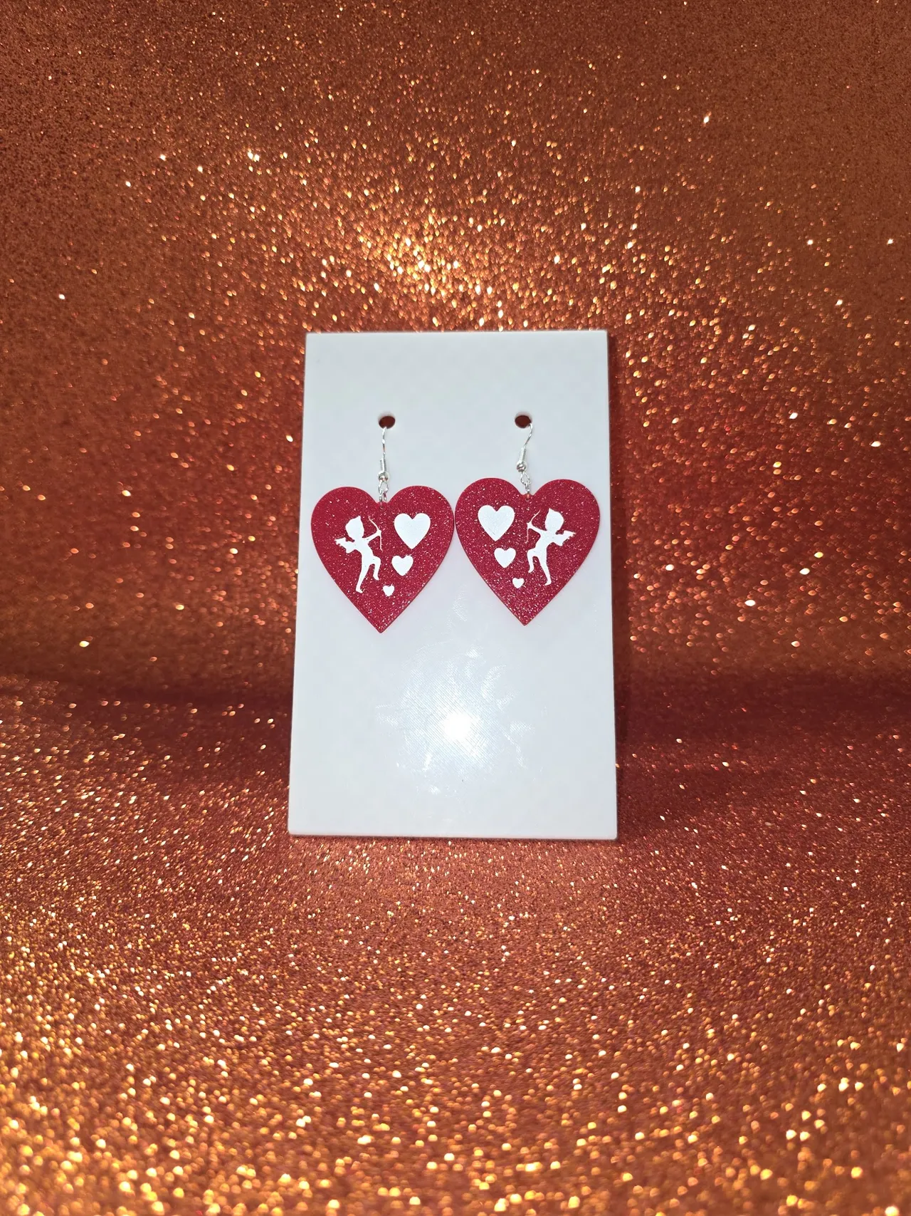 Cupid at work earrings view 2
