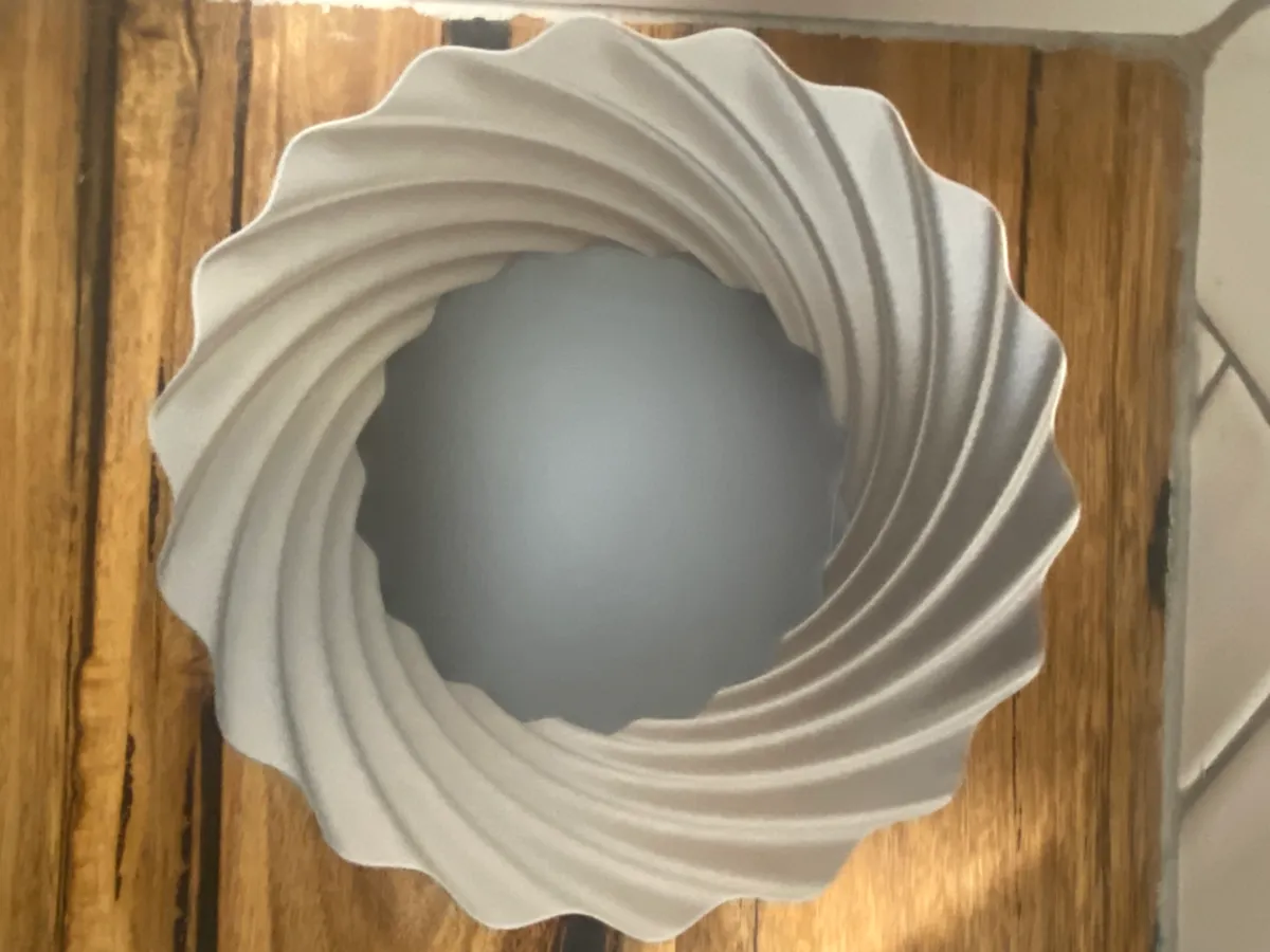 Boîte cylindrique en spirale
