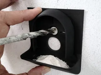 Guía de perforación y colector de polvo