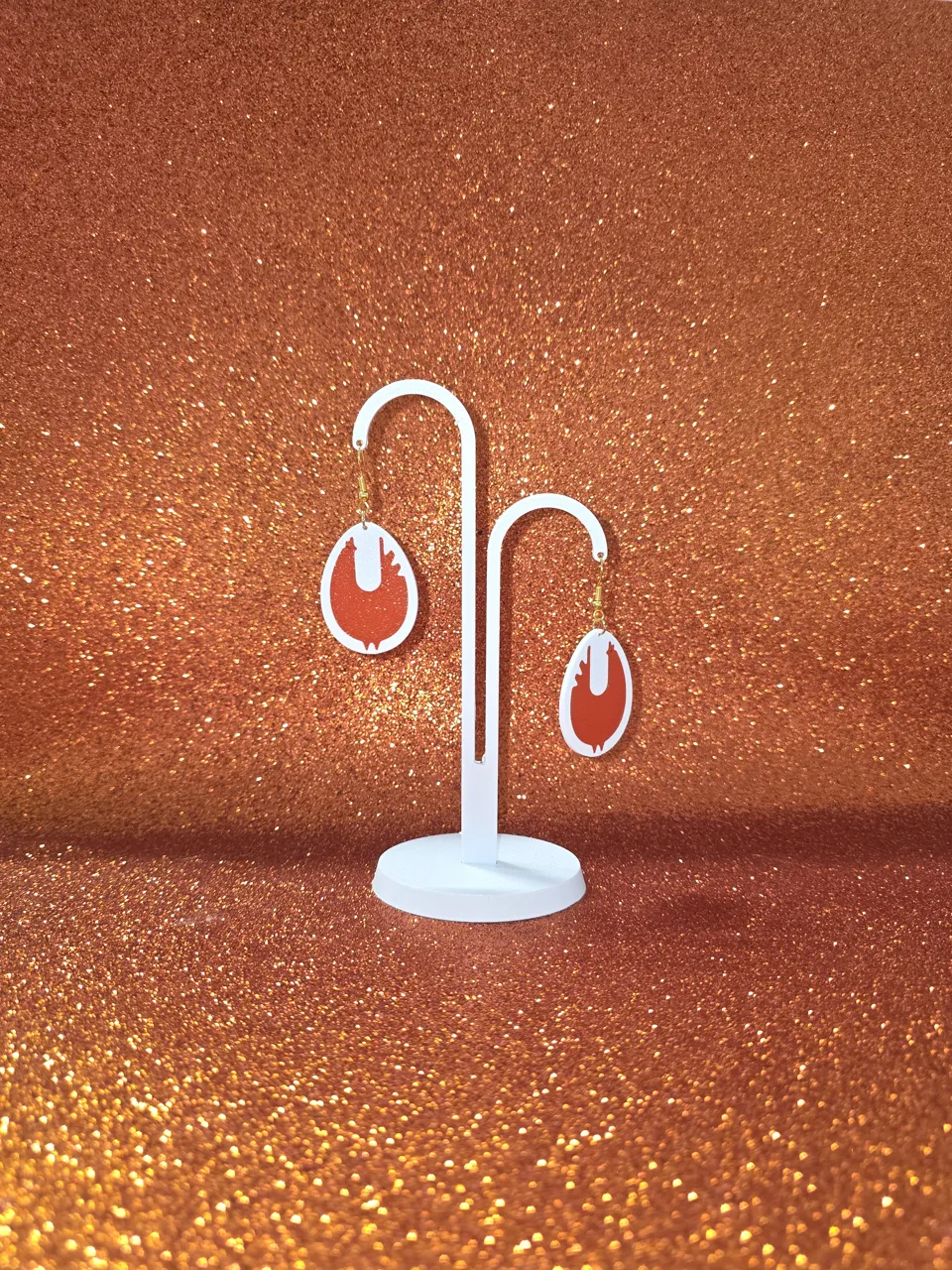 Chicken in the egg earrings view 3