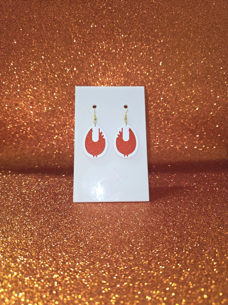 Chicken in the egg earrings view 2