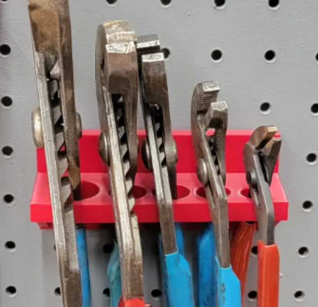 Channel lock holder for peg board