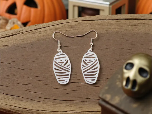 Mummy in sarcophagus earrings