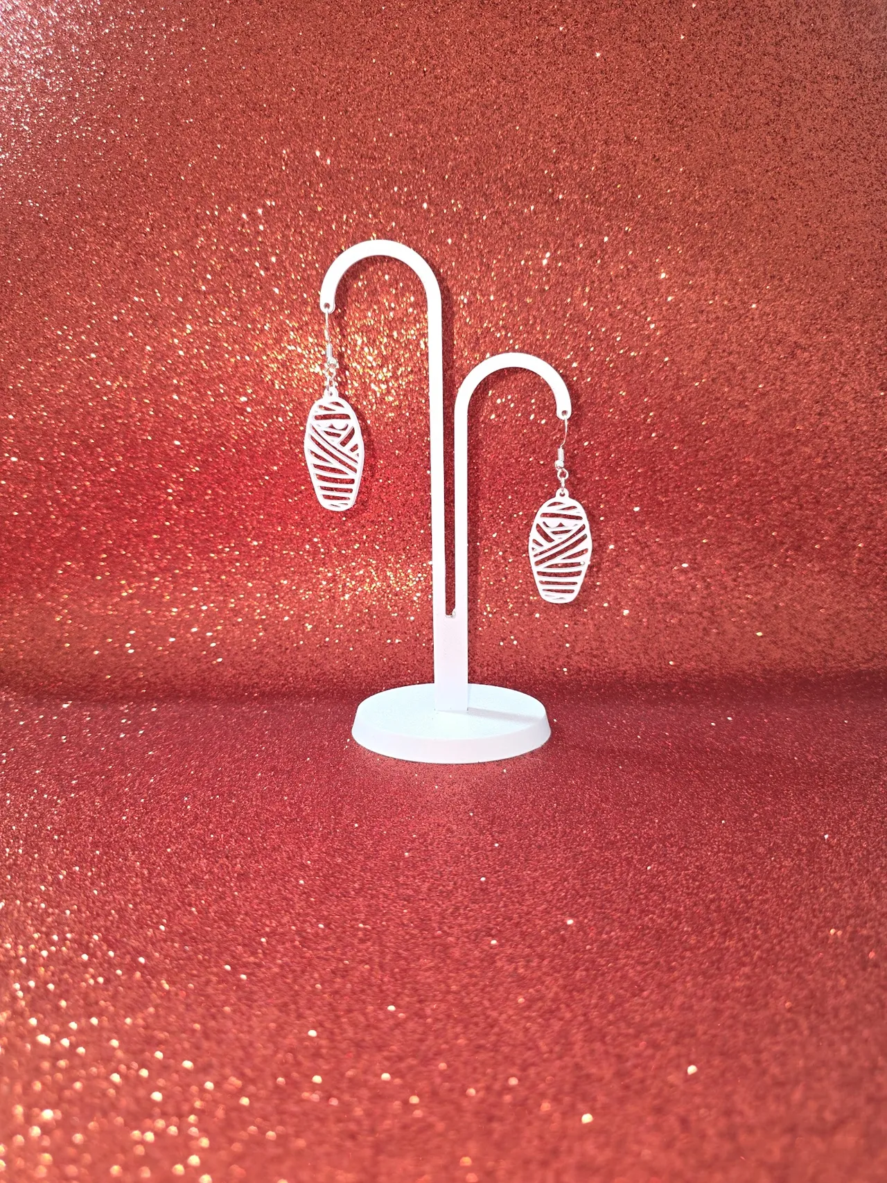 Mummy in sarcophagus earrings view 3