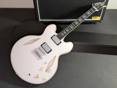 Dave Grohl Gibson DG-335 miniature guitar
