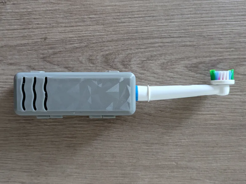The Oral‑B case becomes a manual toothbrush