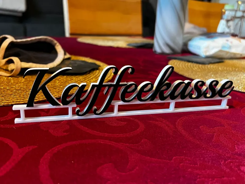 Kaffeekasse Schriftzug