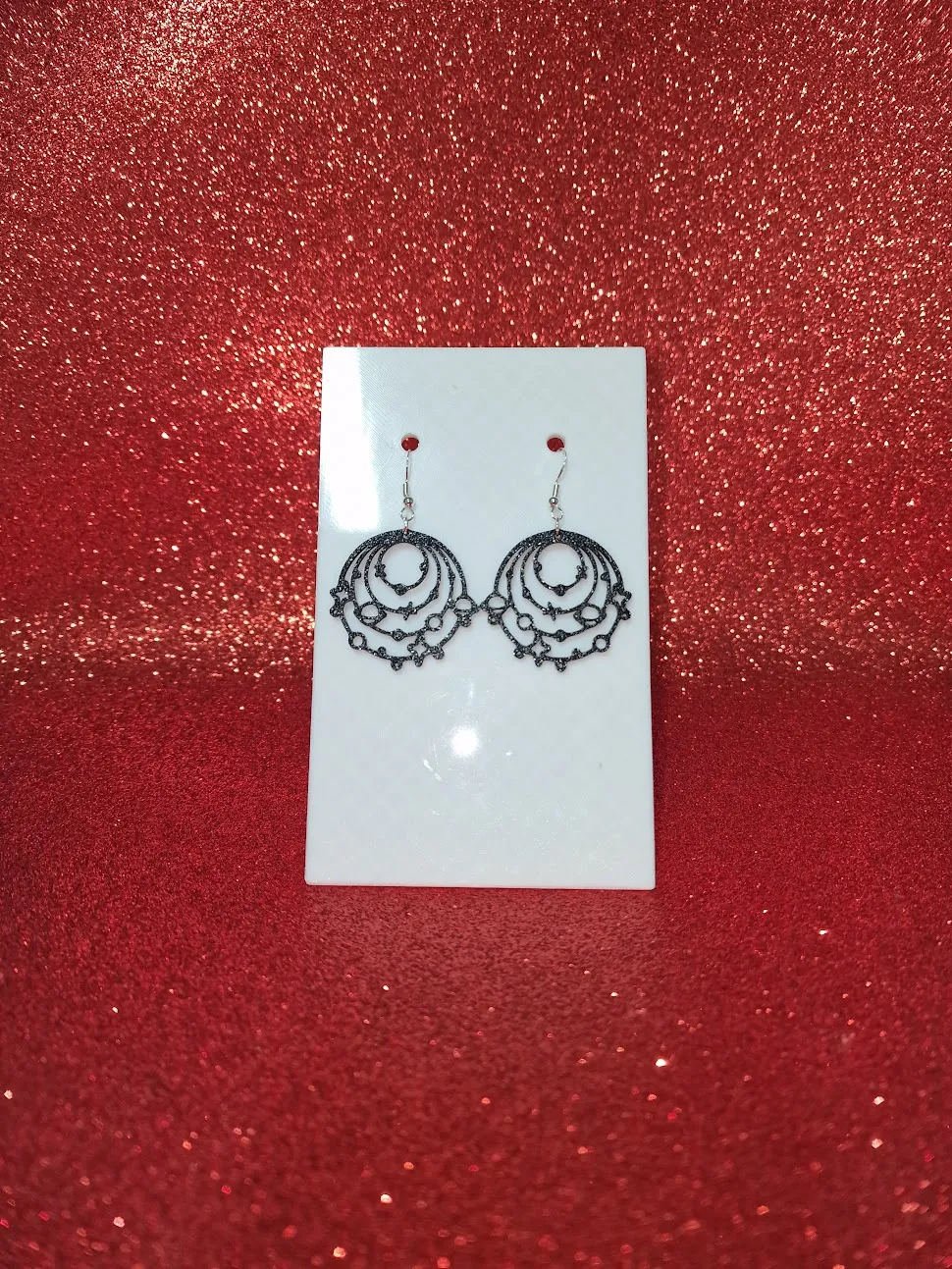 Planets and stars earrings view 2