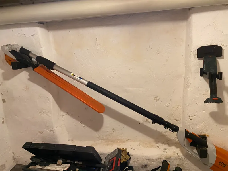 Wall mount for Stihl HLA85 trimmer