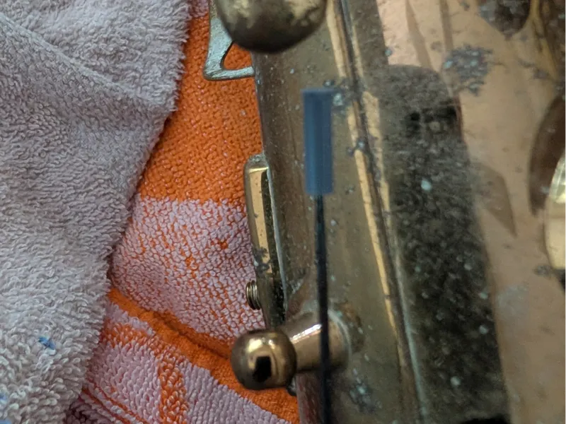 Needle caps, useful for woodwind needle springs