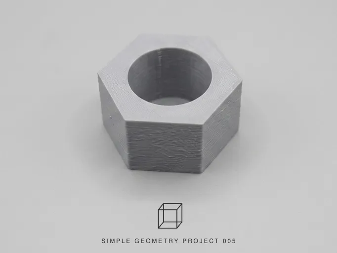 005-AN HEX EXTRUSION WITH A ROUND HOLE