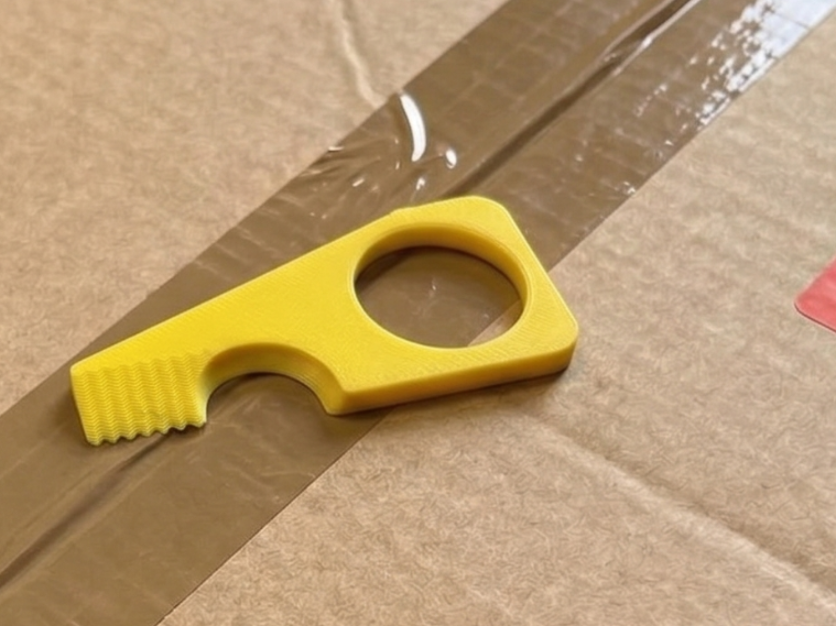 Ergonomic Parcel Cutter – Tape & Box Opening Tool