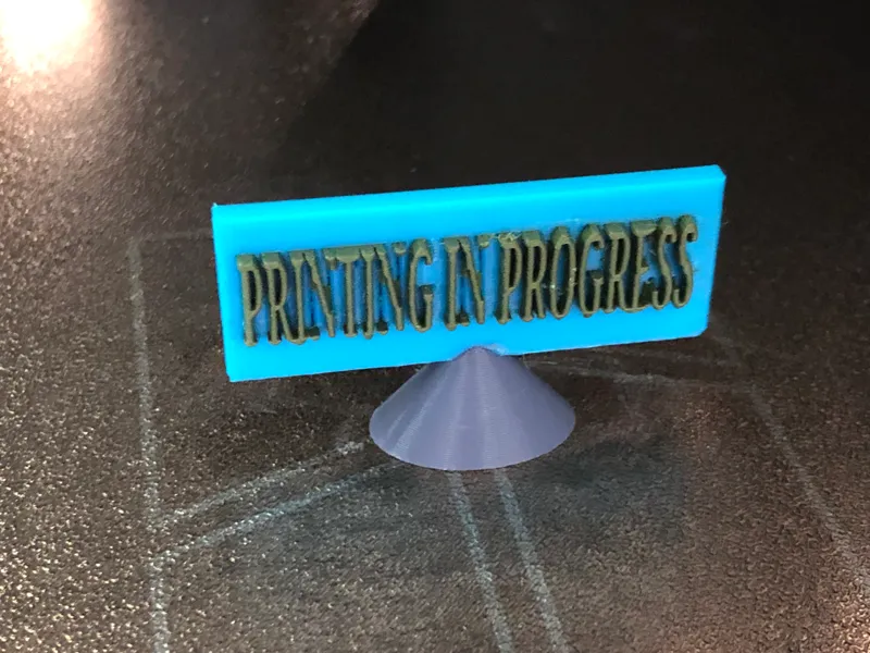 Printing in Progress Sign