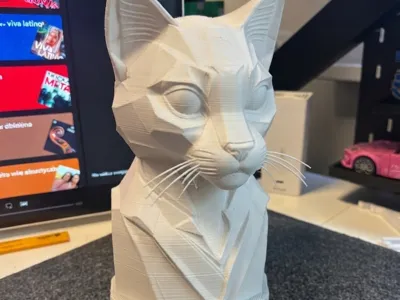 Purring Masterpiece: Adorable Cat Bust Sculpture!