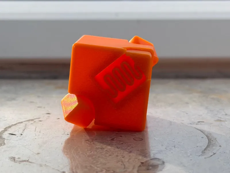 Spinning fidget-cube with button