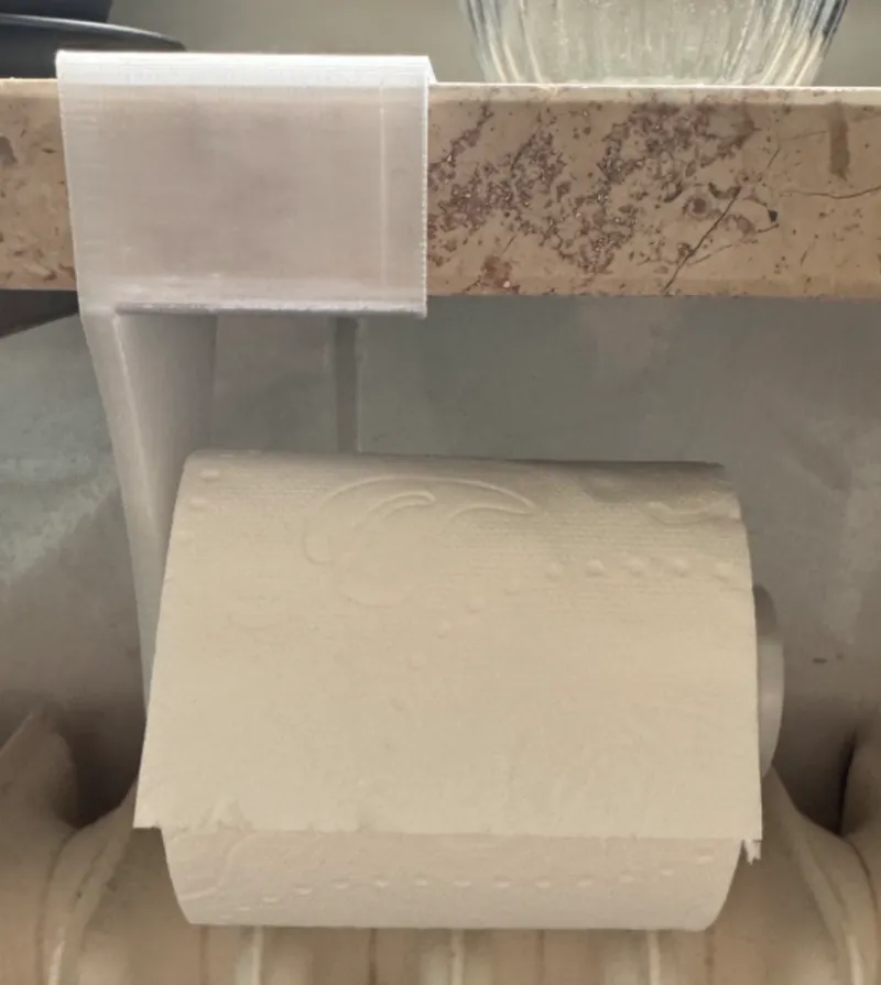 Toilet paper holder for windowsill.