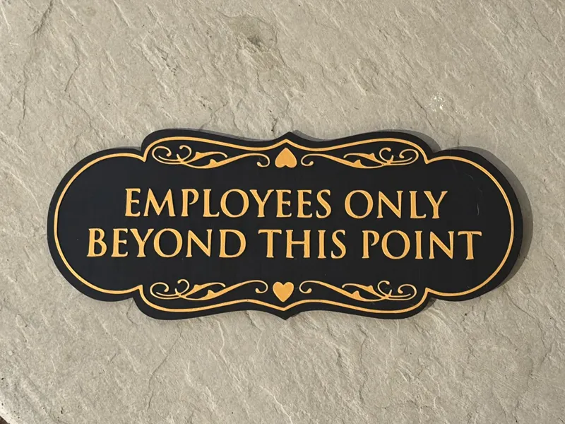 Employees Only Beyond This Point Sign