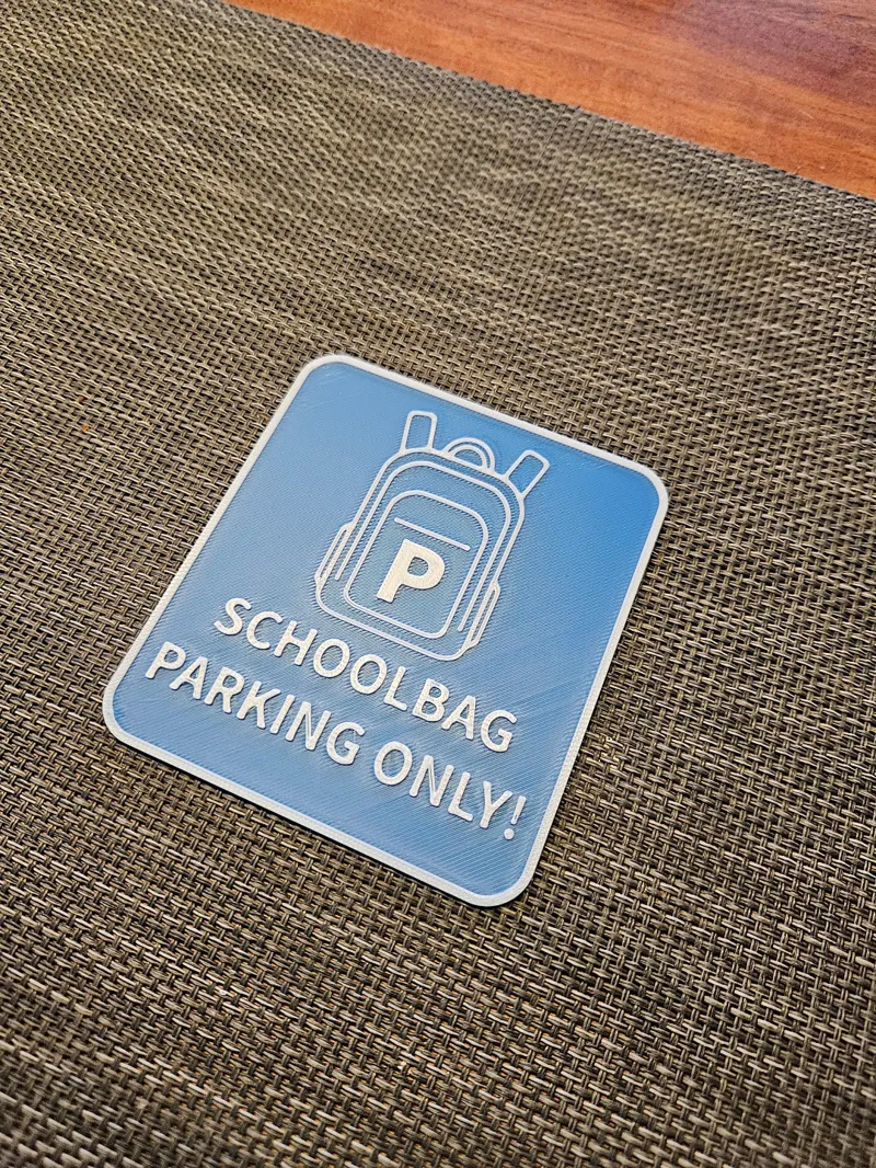 Sign Schoolbag Parking only