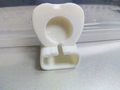 Apple-shaped Apple Watch stand