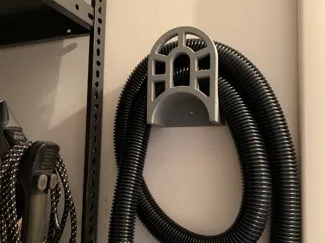 Semplice porta tubo per aspirapolvere, no supporti