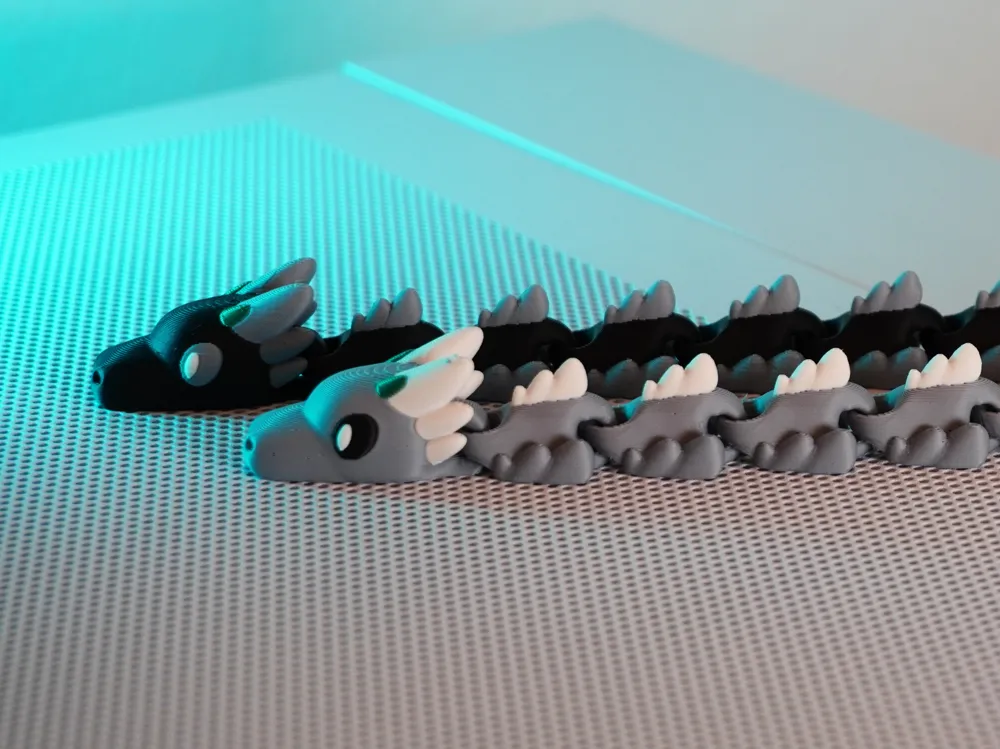 Cloud Wyrm - Articulated Dragon - Free 3D Print Model - MakerWorld