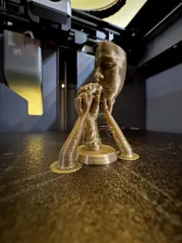 0.12mm layer, 2 walls, 15% infill, scale to expected size