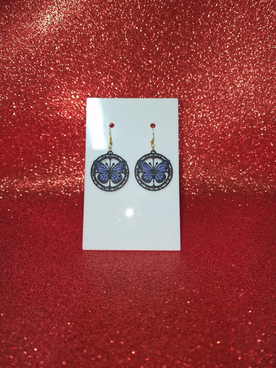 Butterfly in a round earrings view 2