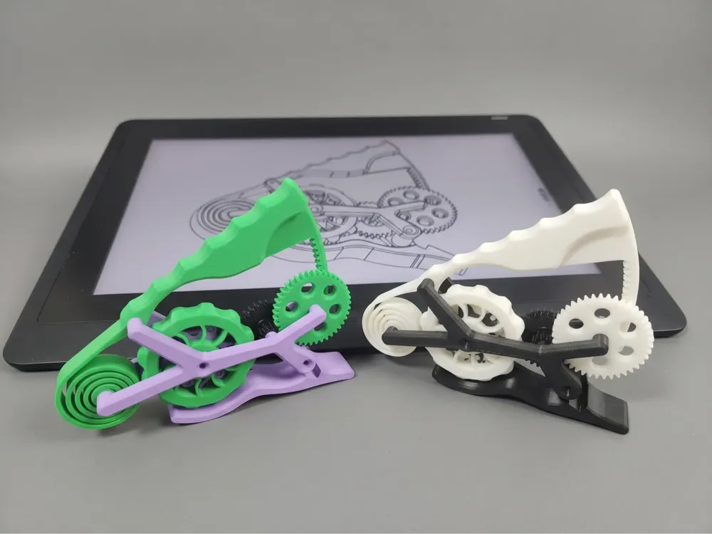 Objeto manipulable: Squeeze to Spin! (geared fidget toy). Referencia del modelo original.