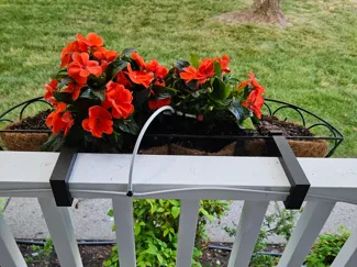 Flower basket hanger to fit over 2x4 porch rail