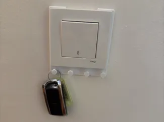 Light switch frame key hanger