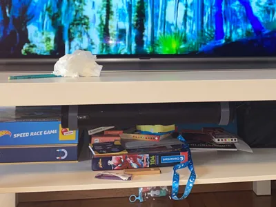 Hook for hanging a soundbar under furniture