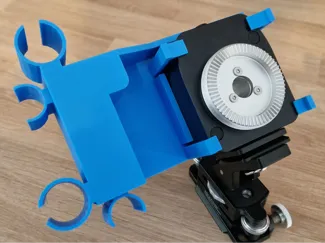 Nomad tracker attachment for scope and laser