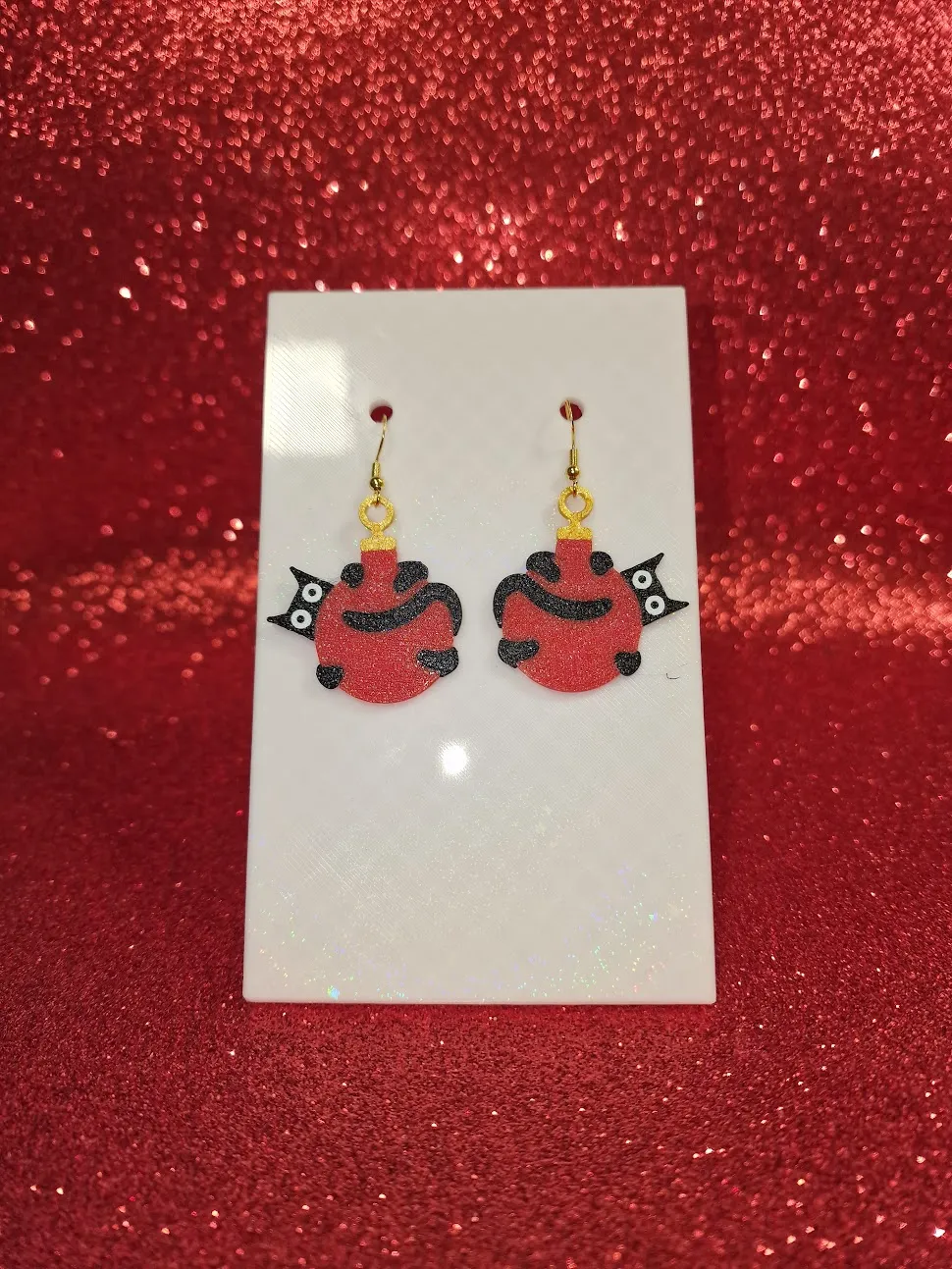 Guilty cat earrings view 2