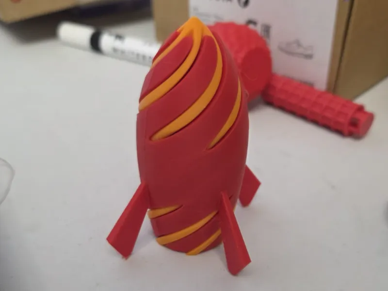 Sprial pass through fidget rocket
