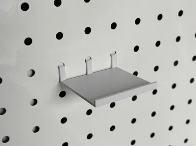 Small item stand for pegboard