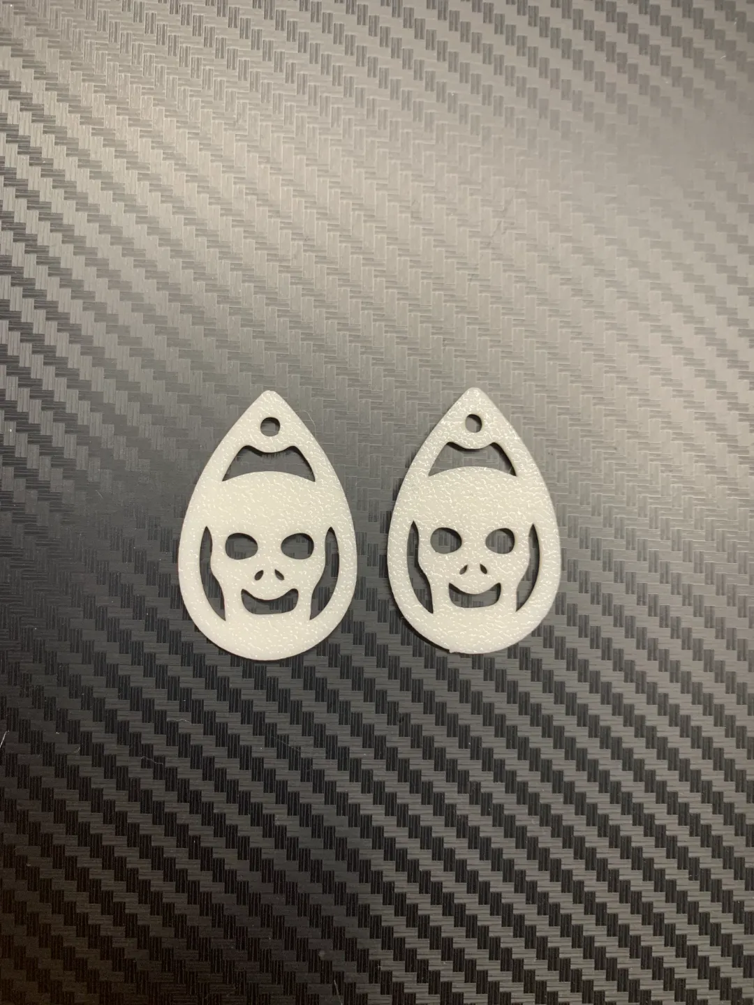 Skull earrings view 2