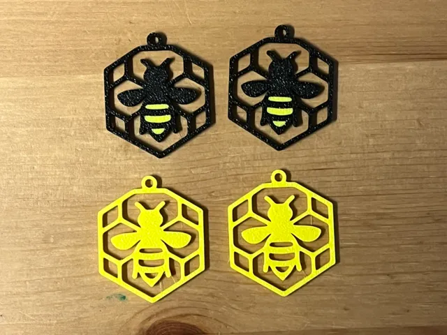 x2 Bee Earrings On Separate Plates