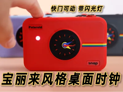 Polaroid Snap instant camera style desktop clock | light up when pressing the shutter