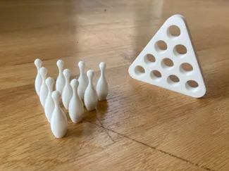 Marble bowling pins and setter