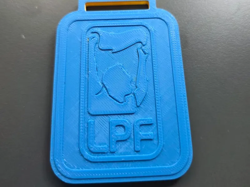 Medalla Apertura 2026 Belgrano LPF