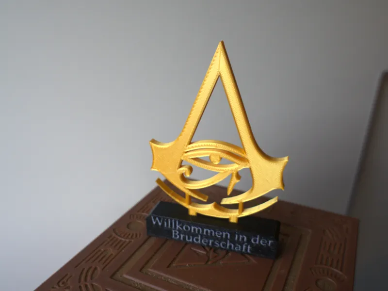 Assassin's Creed Origins Logo mit Ständer