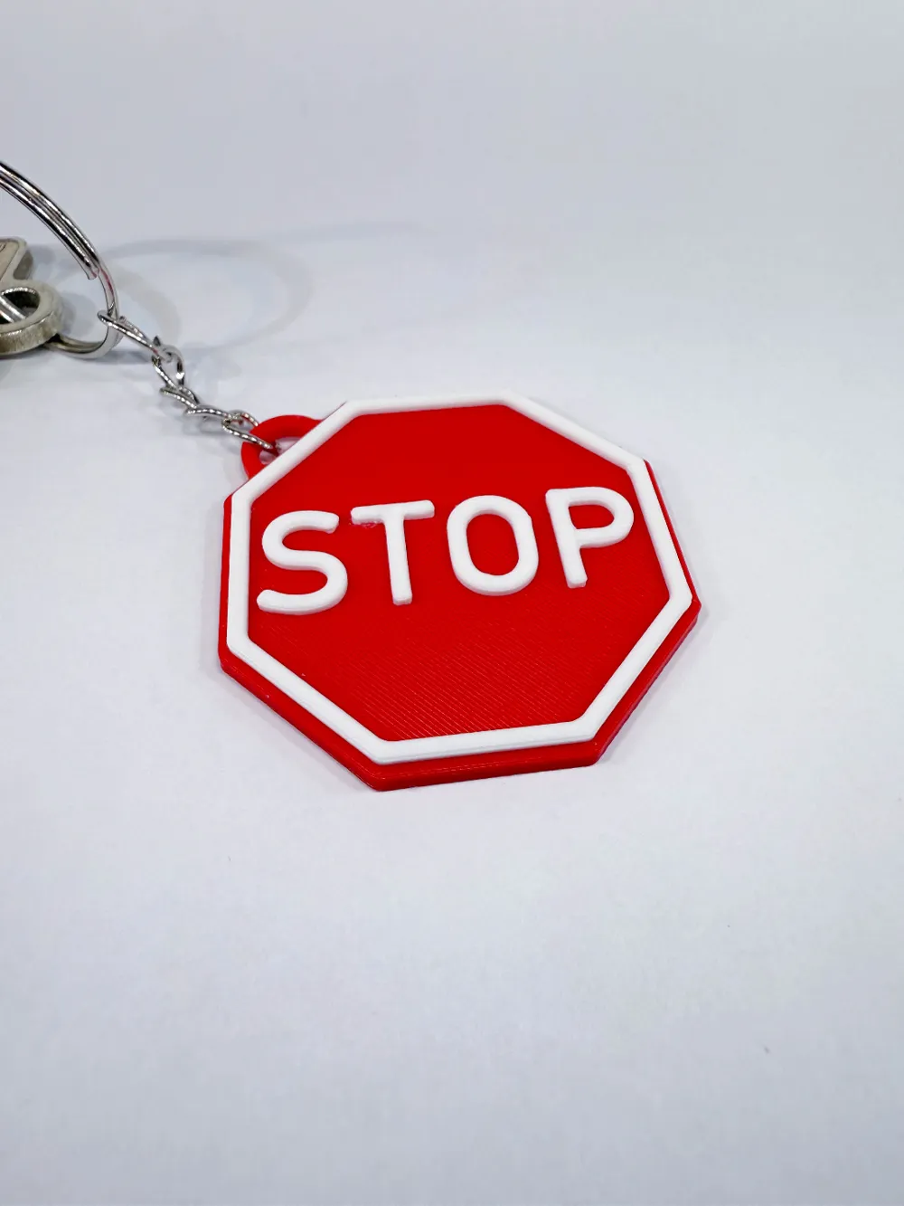 Stopgap Ramp Keychain Stop sign keychain dual color no-ams needed by konstantin503 - MakerWorld