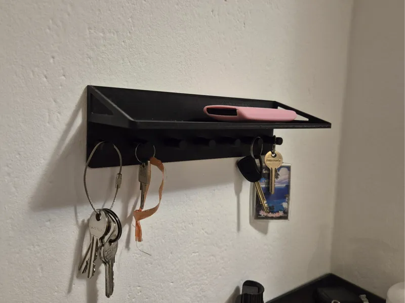 Key rack with shelf.
