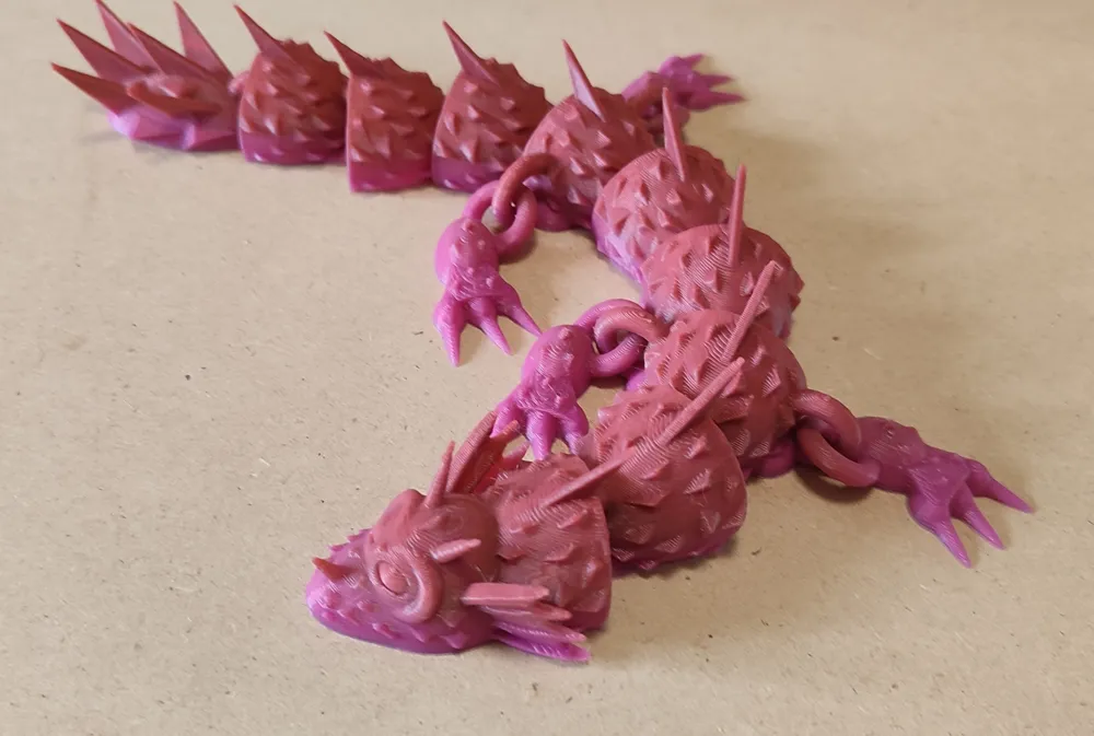 Articulated dragon - Free 3D Print Model - MakerWorld