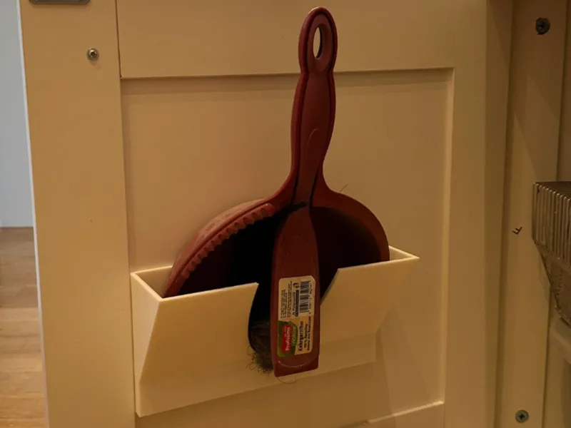 Halter für Kehrschaufel und Besen