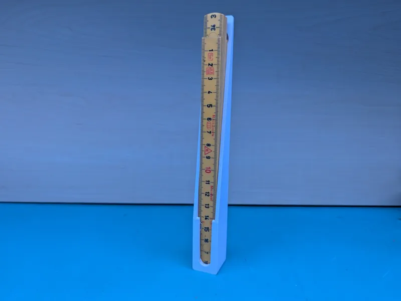 Folding ruler holder for multiboard