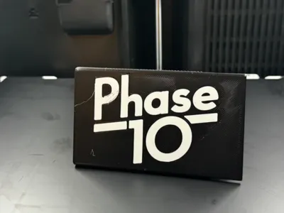 Phase 10 box with snapping slide-lid